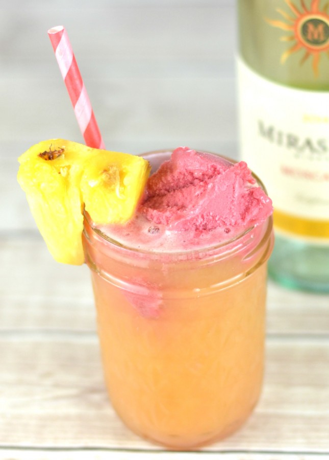 Love moscato? Then you must try this tropical sunrise moscato punch! It's to die for!
